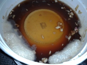 The froth is not a bad thing-it's just an indication of the fermentation.